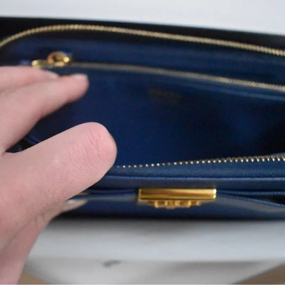 Prada Blue Wallet with Gold Accents